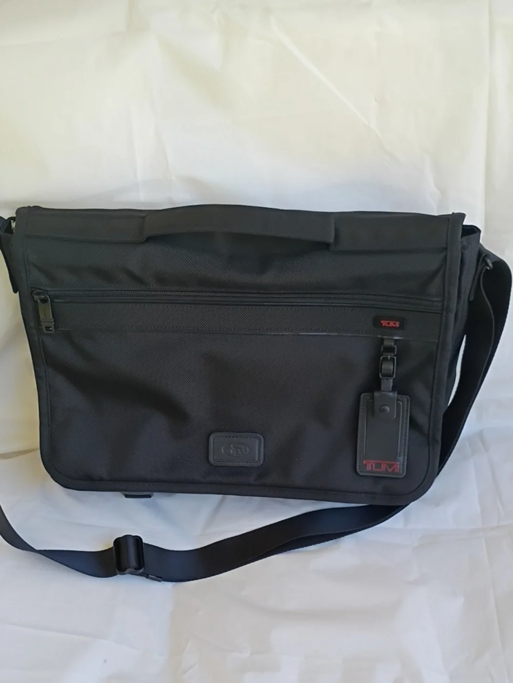 Tumi Black Nylon Messenger with Red Logo Accent